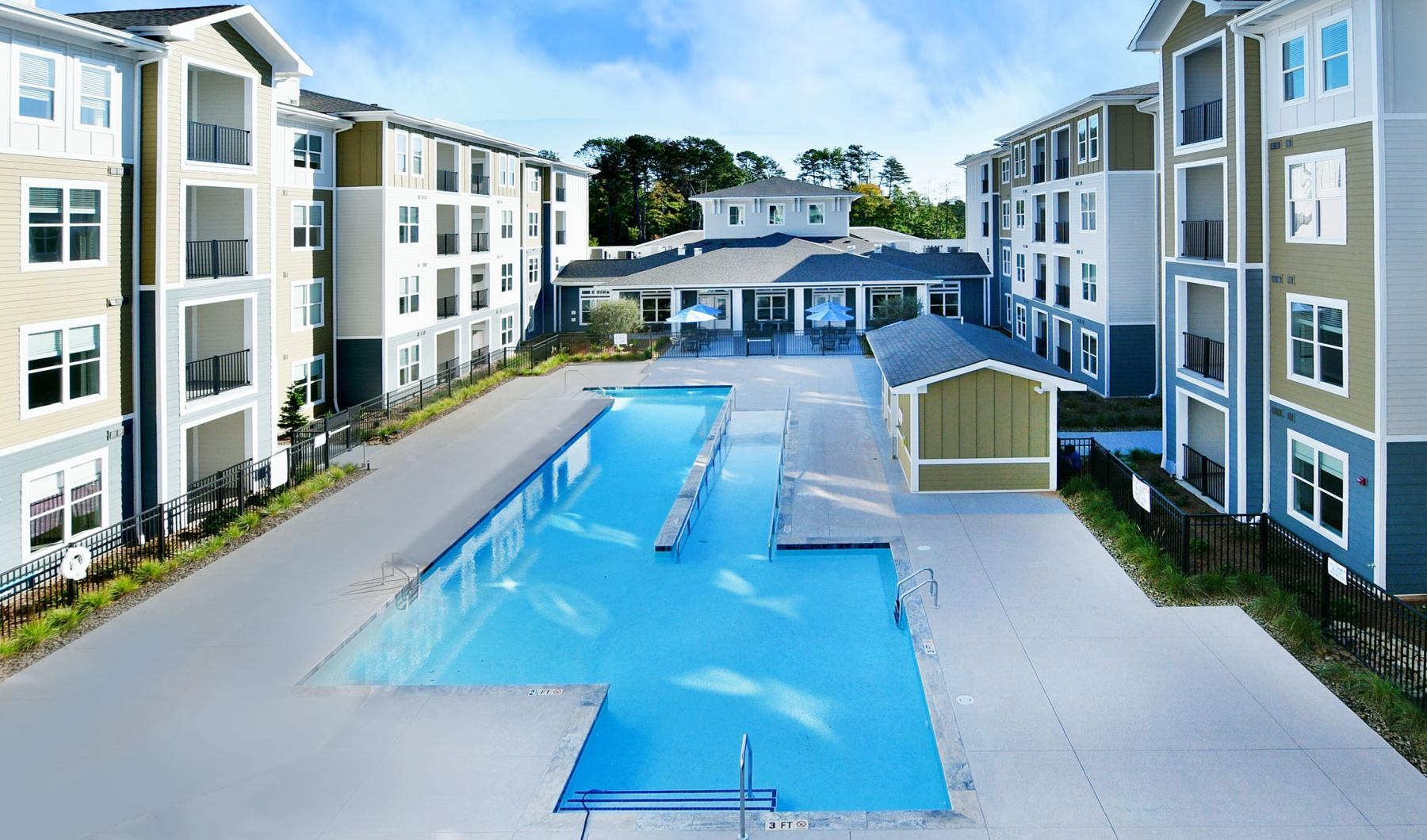 a pool in a row of buildings